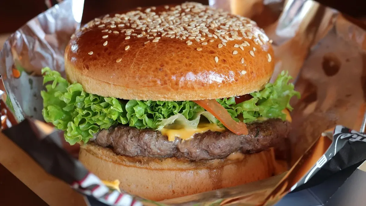 A nutritional comparison shows McDonald's classic cheeseburger contains less sodium than Burger King's version, while...