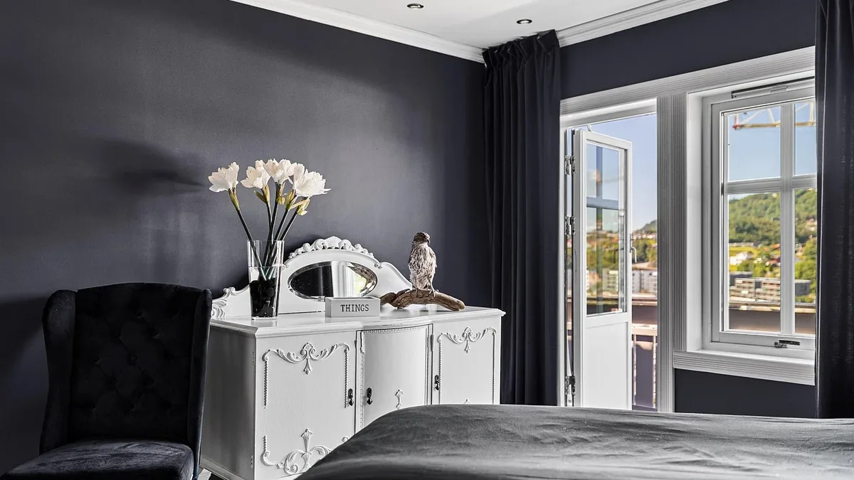 Designers suggest five simple swaps, like scented candles and wool throws, to make a bedroom feel cozier for autumn...