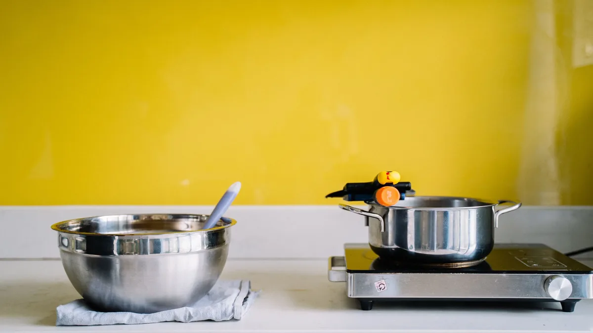 A writer tested Muji's new Electric Grill Pot for a week, cooking snacks and full meals to assess its performance across...