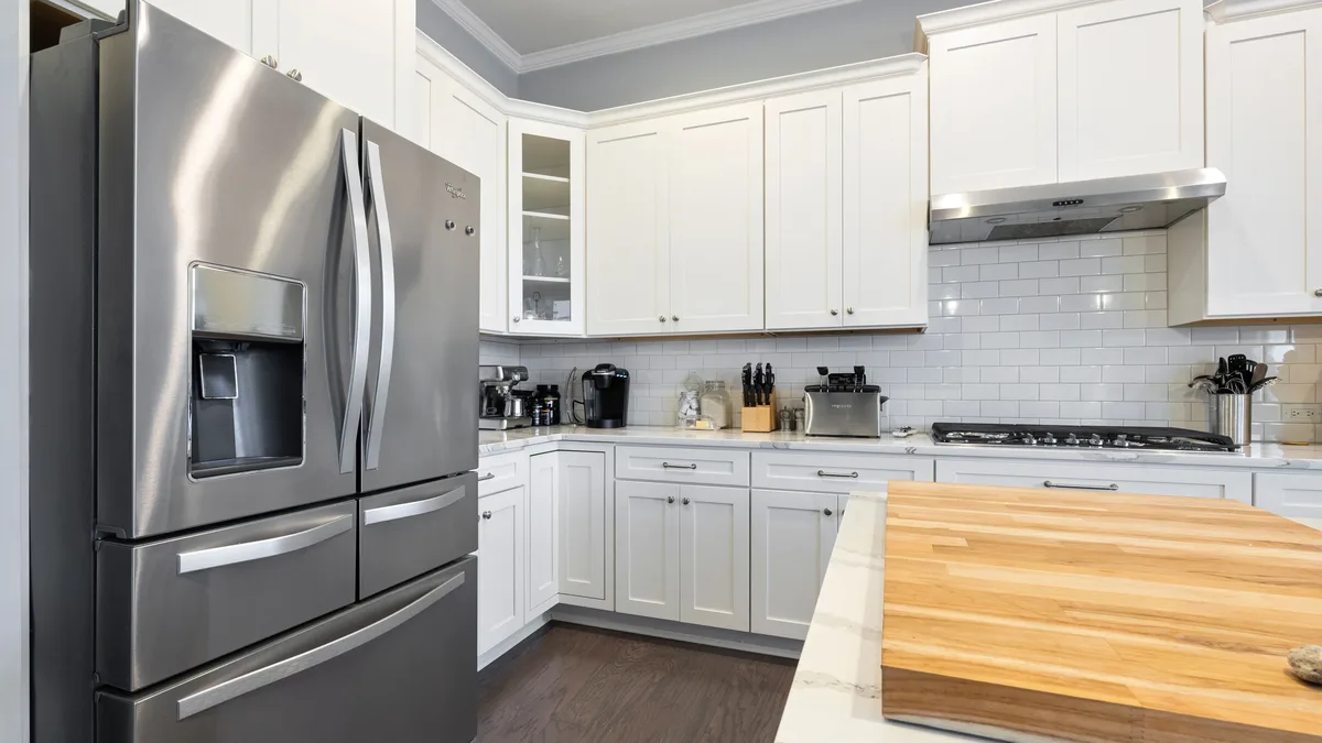 The Ninja SLUSHi Twist is a large countertop appliance that makes dual-flavor slushies and frozen cocktails without ice