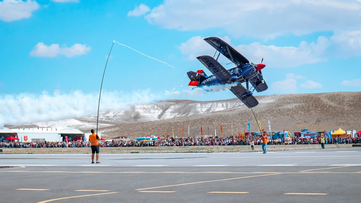 Two Airlink Embraer E-Jets performed an extremely low flyover at a packed rugby stadium in Cape Town on Saturday, with...