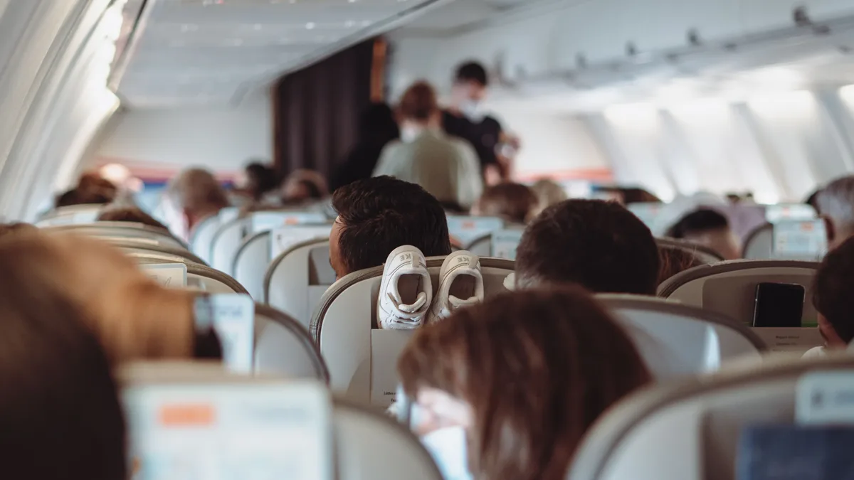 A former flight attendant explains why cabin crew are increasingly losing patience during the summer travel season...