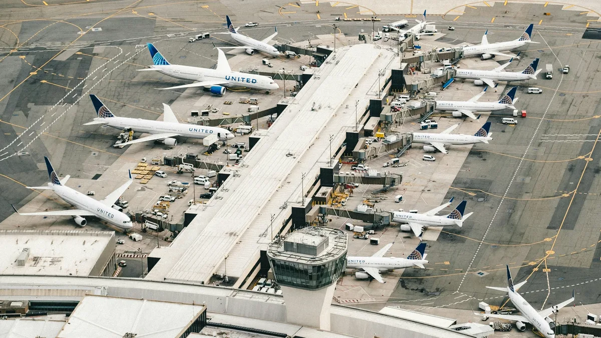 Washington Dulles International Airport is opening a new concourse and planning a $20 billion overhaul to manage growth...