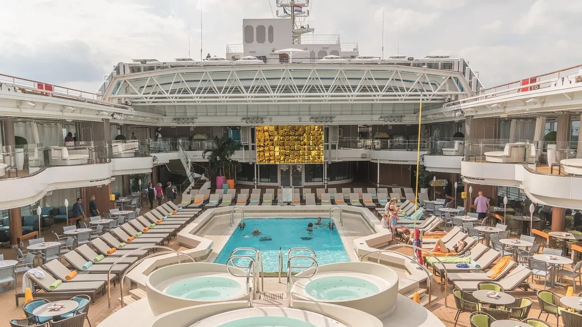 Royal Caribbean's RoyalUp program now lets passengers bid on premium experiences like cabanas and beach beds at Perfect...
