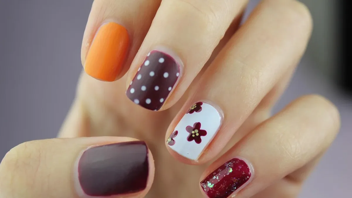 Lead manicurist Gina Edwards created custom, moody nail art for Christian Cowan's Spring/Summer 2027 show, using magnetic...